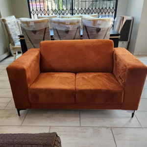 Beautiful 2 seater couch crafted in copper suede