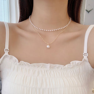 Double pearl necklace with choker