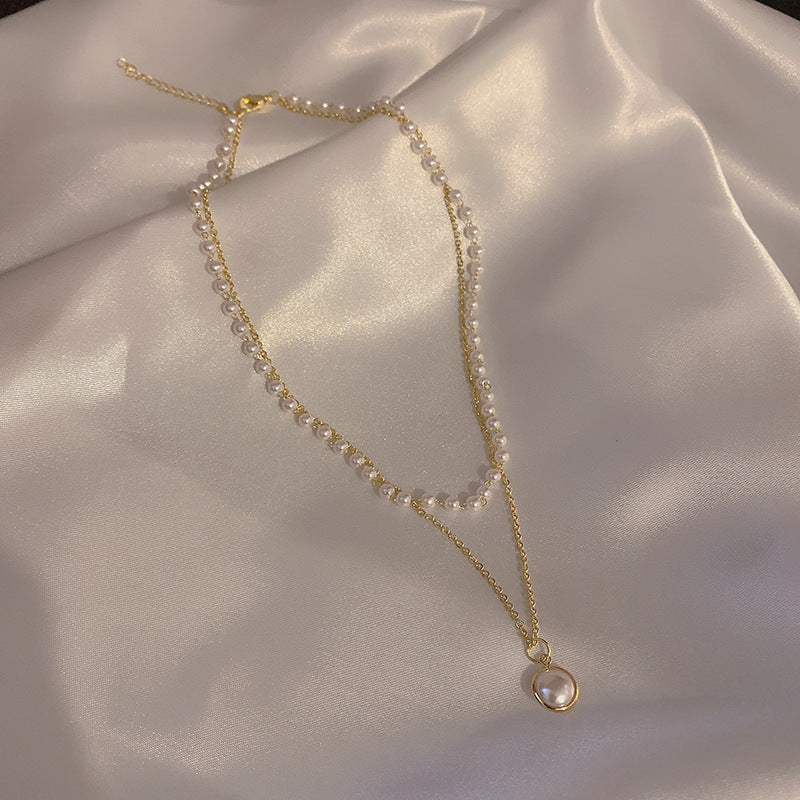 Double pearl necklace with choker