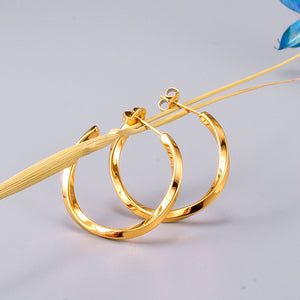 Elegant twist hoop earrings